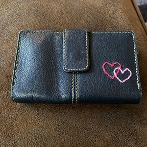 Black Fossil tri-fold Ladies wallet.
